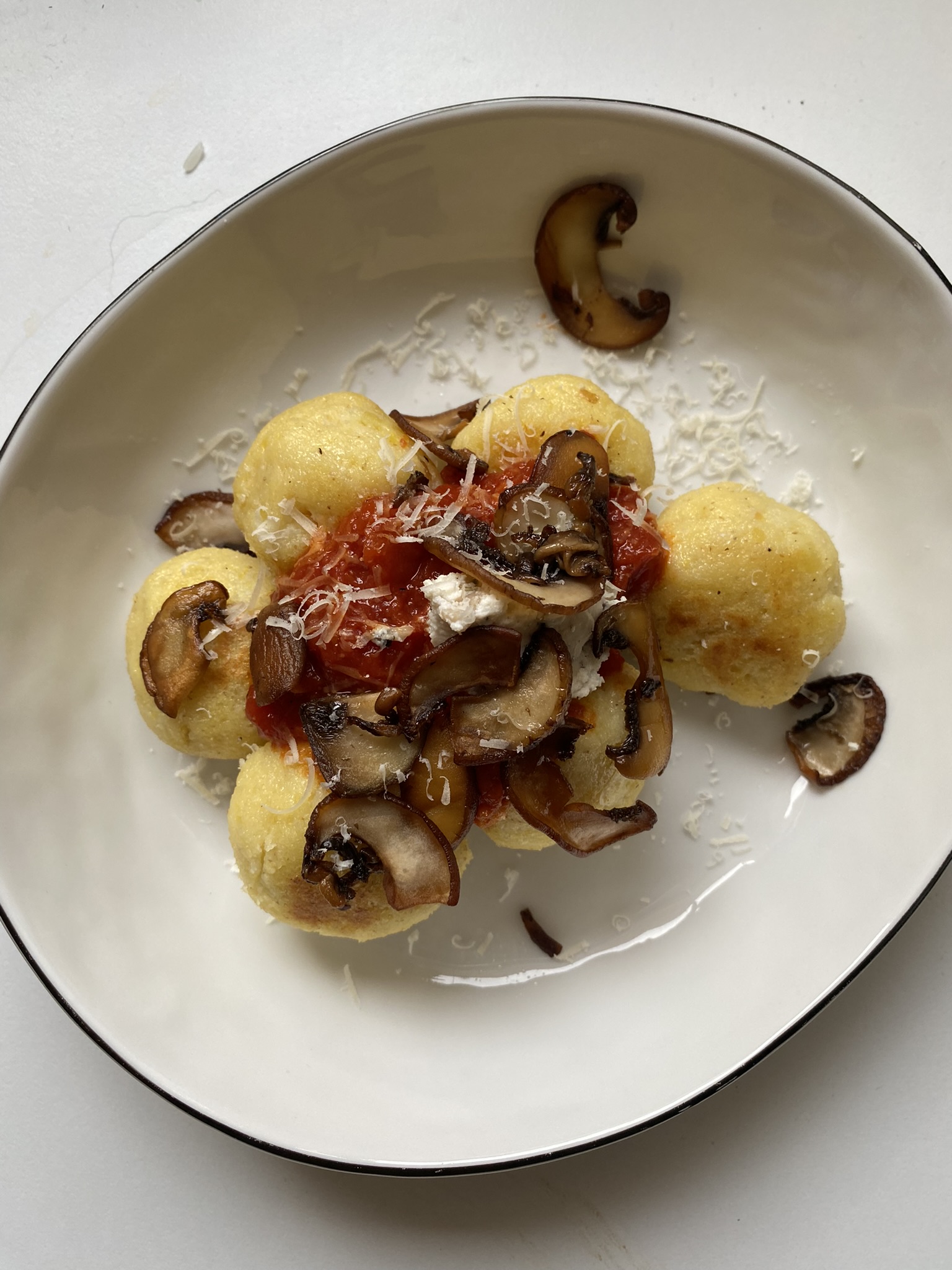Gnudi filled with Ricotta Cheese and Tomato Sauce